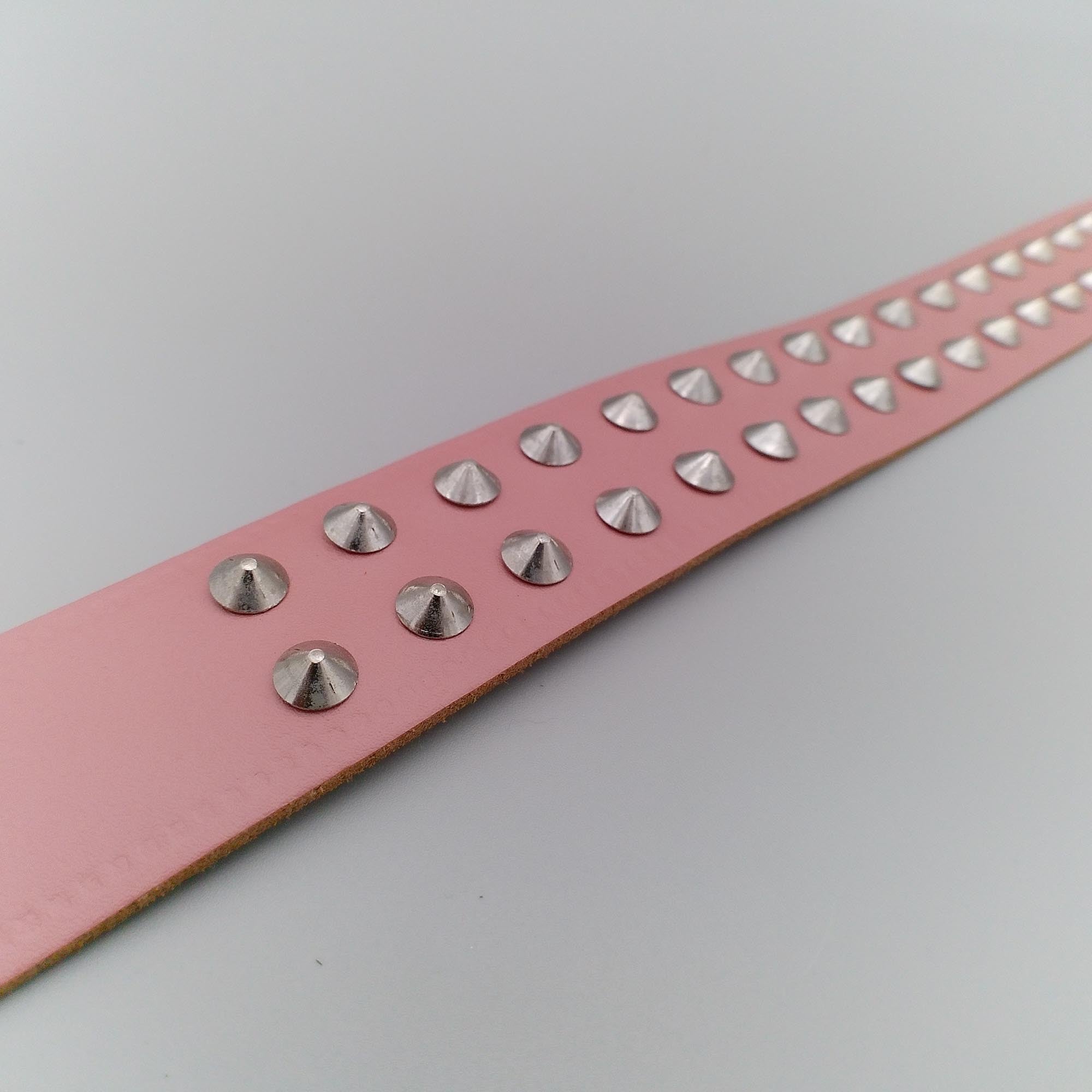 real-rose-leather-belt-with-two-rows-of-conical-studs